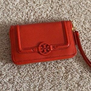 Orange Tory Burch Wristlet